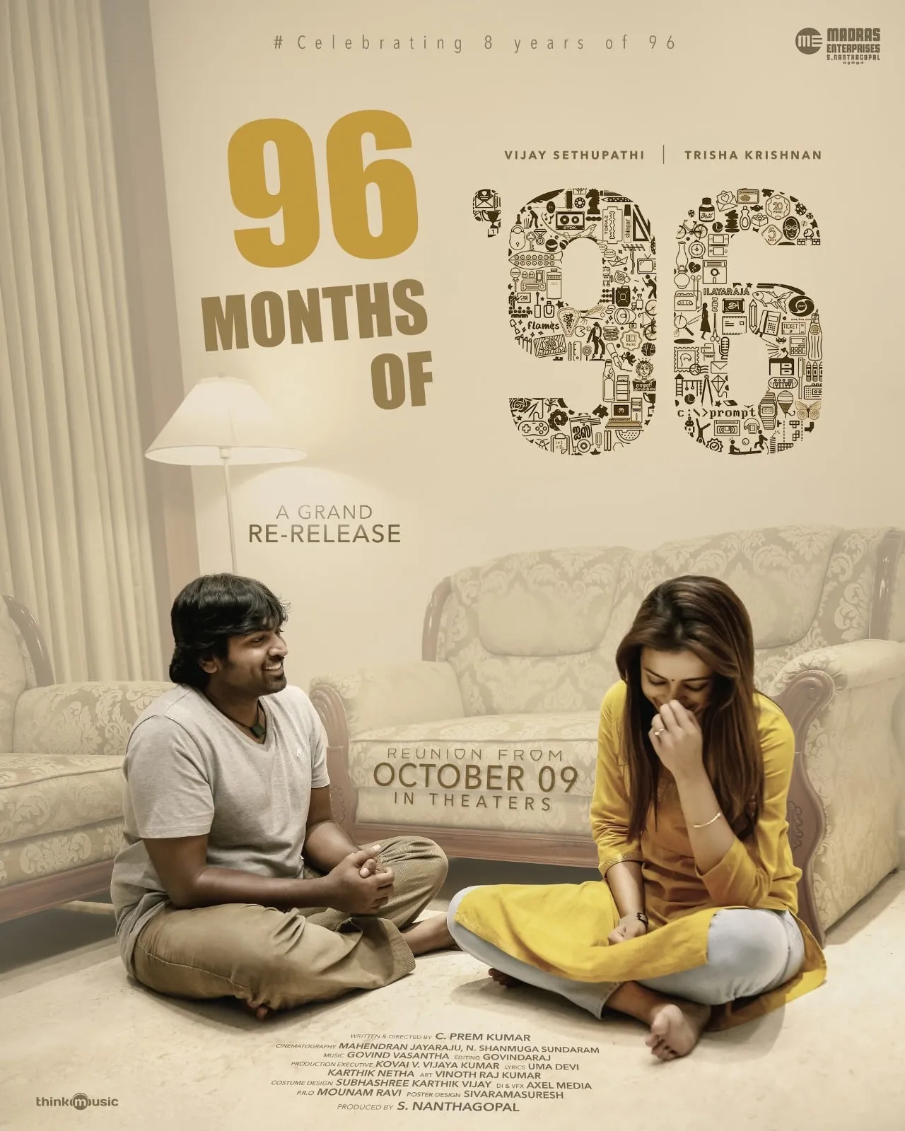 96 re-release poster with Vijay Sethupathi and Trisha sitting on the floor in front of a sofa under the words 96 Months of 96
