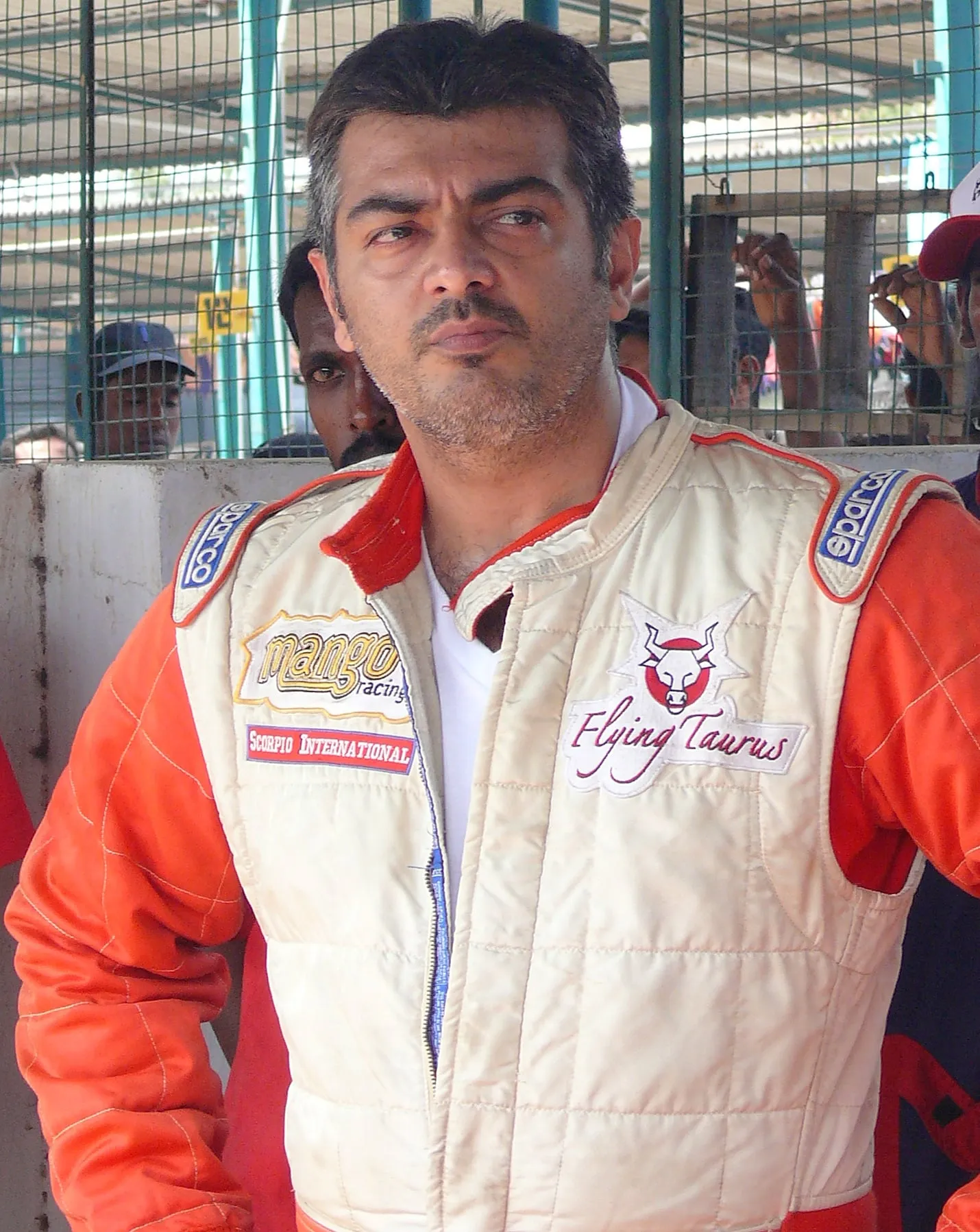 Ajith Kumar in racing gear at the Irungattukottai race track