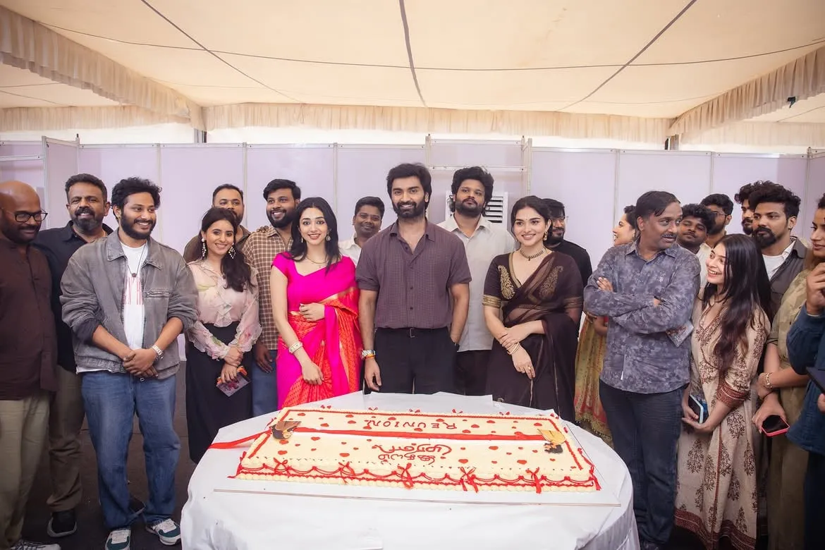 Atharvaa and the Idhayam Murali cast cut a cake reading Reunion at the film's thanksgiving meet