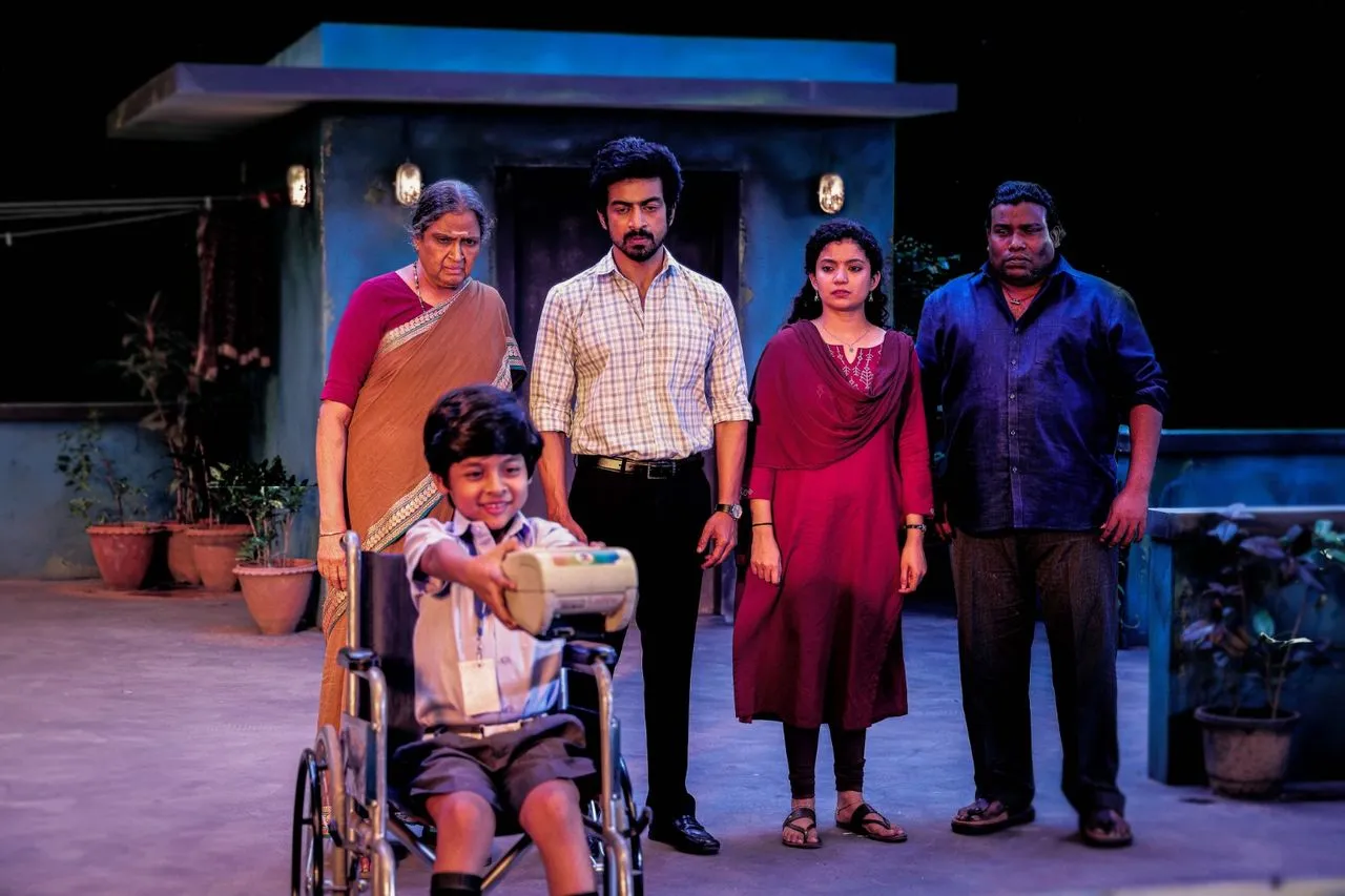 Con City cast including Arjun Das and Anna Ben in a scene from the film