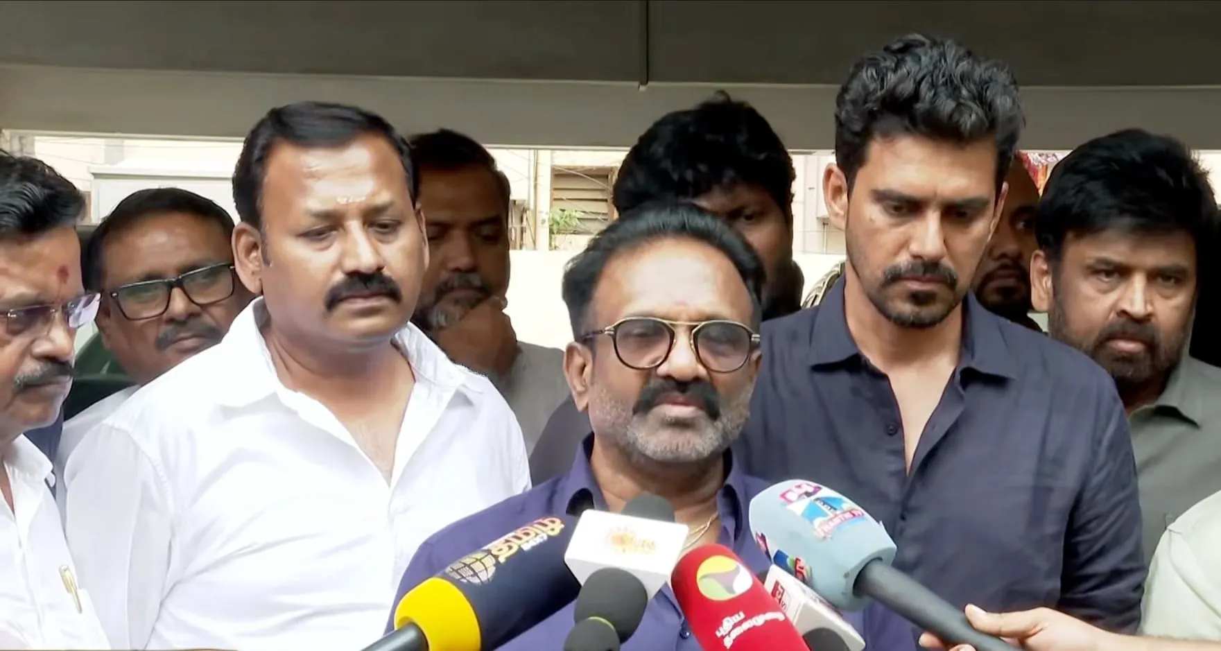 Producers Siva, Kalaipuli S. Thanu and Dream Warrior Pictures' S.R. Prabhu address the press outside Qube Cinema Technologies' office in Chennai after Karuppu screens up north without authorisation.