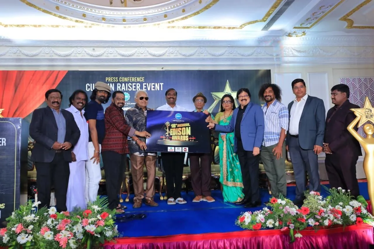 Cinema veterans on stage holding the 18th Edison Awards plaque at the Chennai curtain raiser