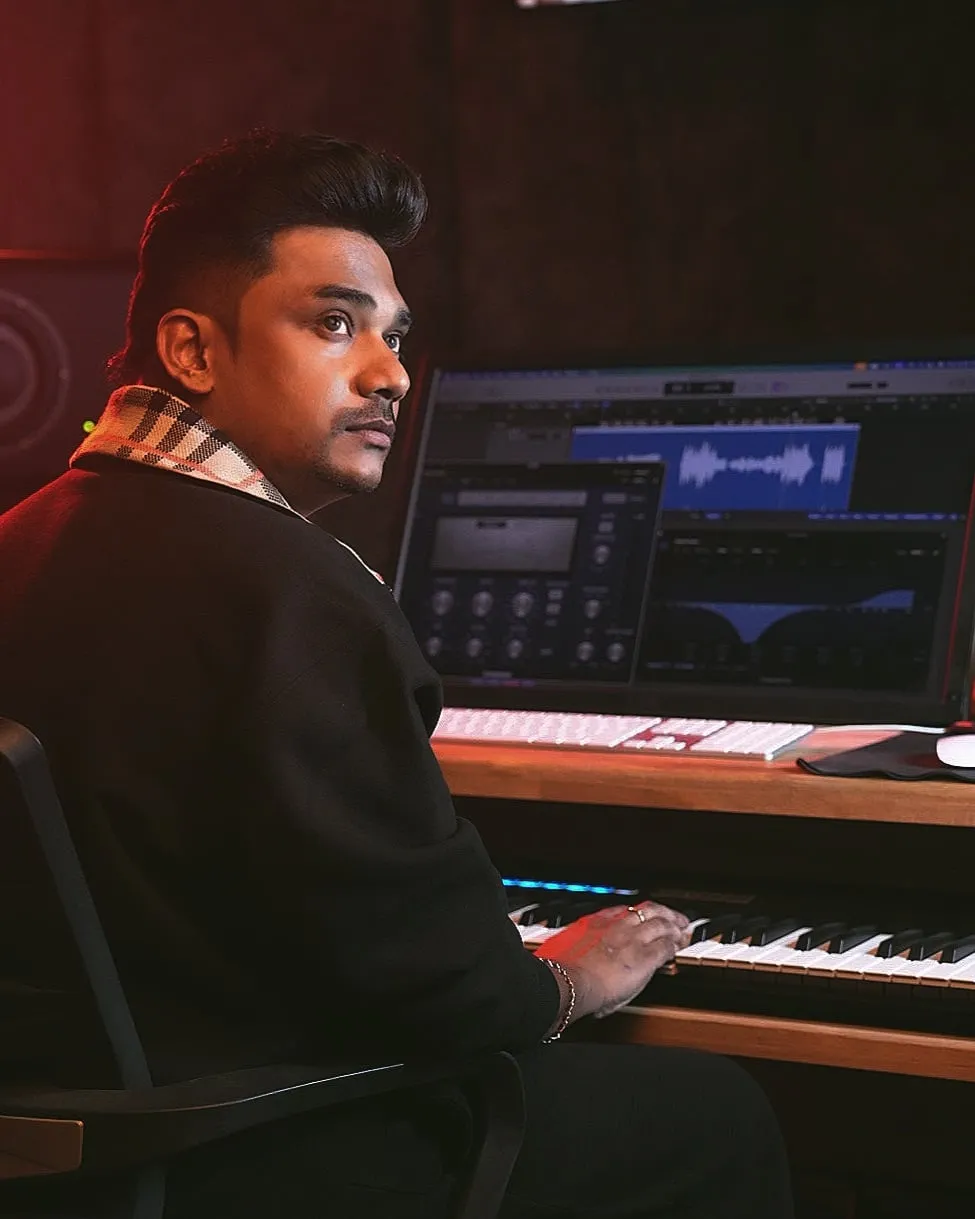 Composer Sam CS at his studio console