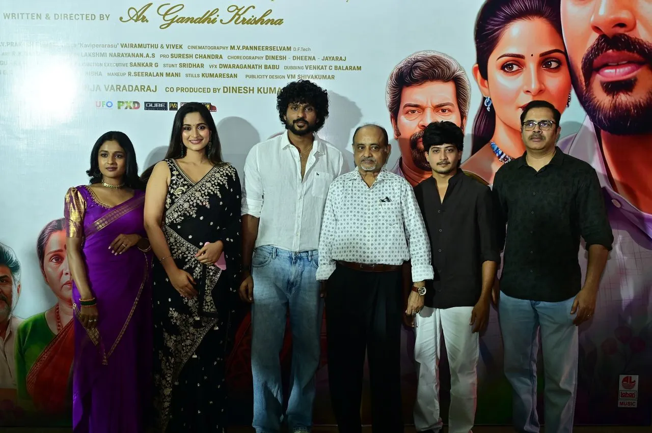 Cast of Breakfast Tamil movie at the film's music launch in front of the Breakfast poster