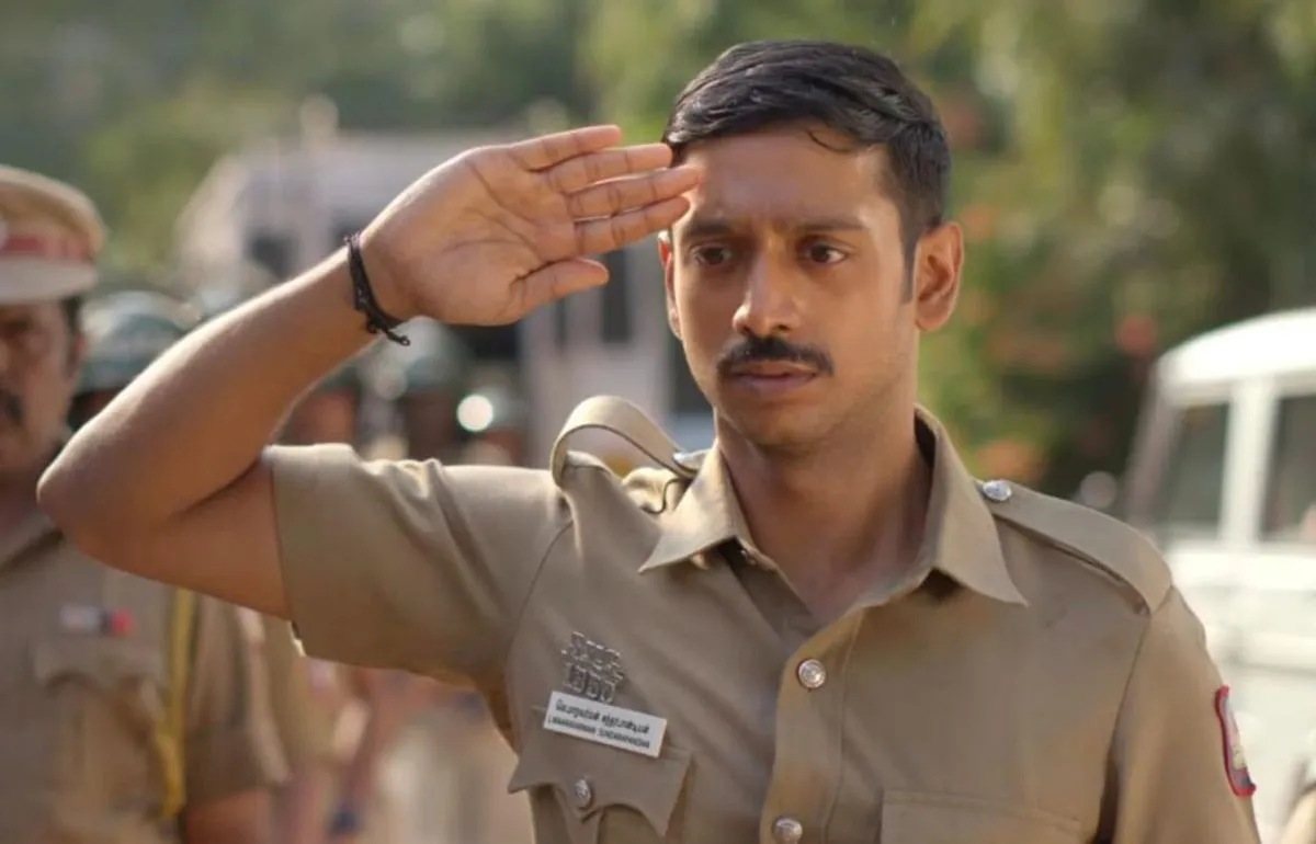 Dhaarshan Ganesan as a police officer in Lenin Pandiyan