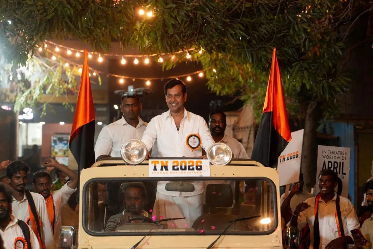 Natty in a jeep with TN 2026 number plate during a rally-style promotional event