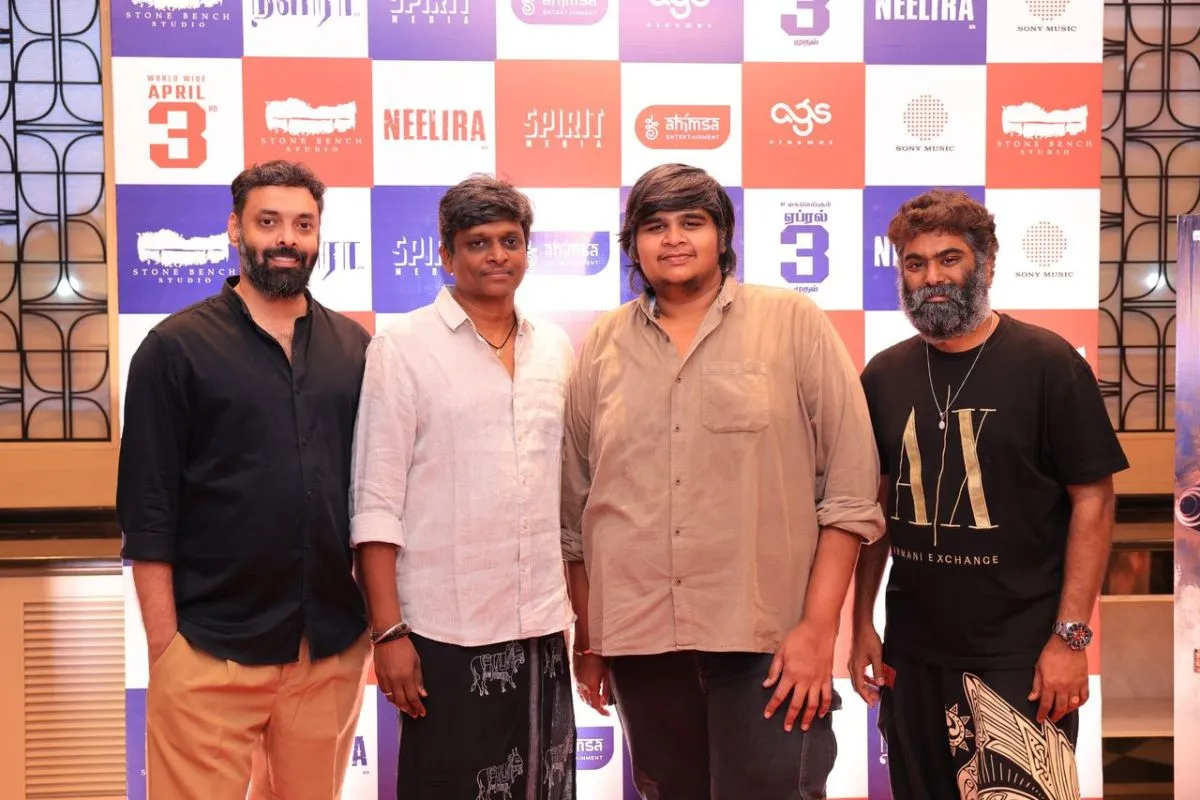 Director Somitharan with Karthik Subbaraj and Karthikeyan Santhanam at the Neelira event