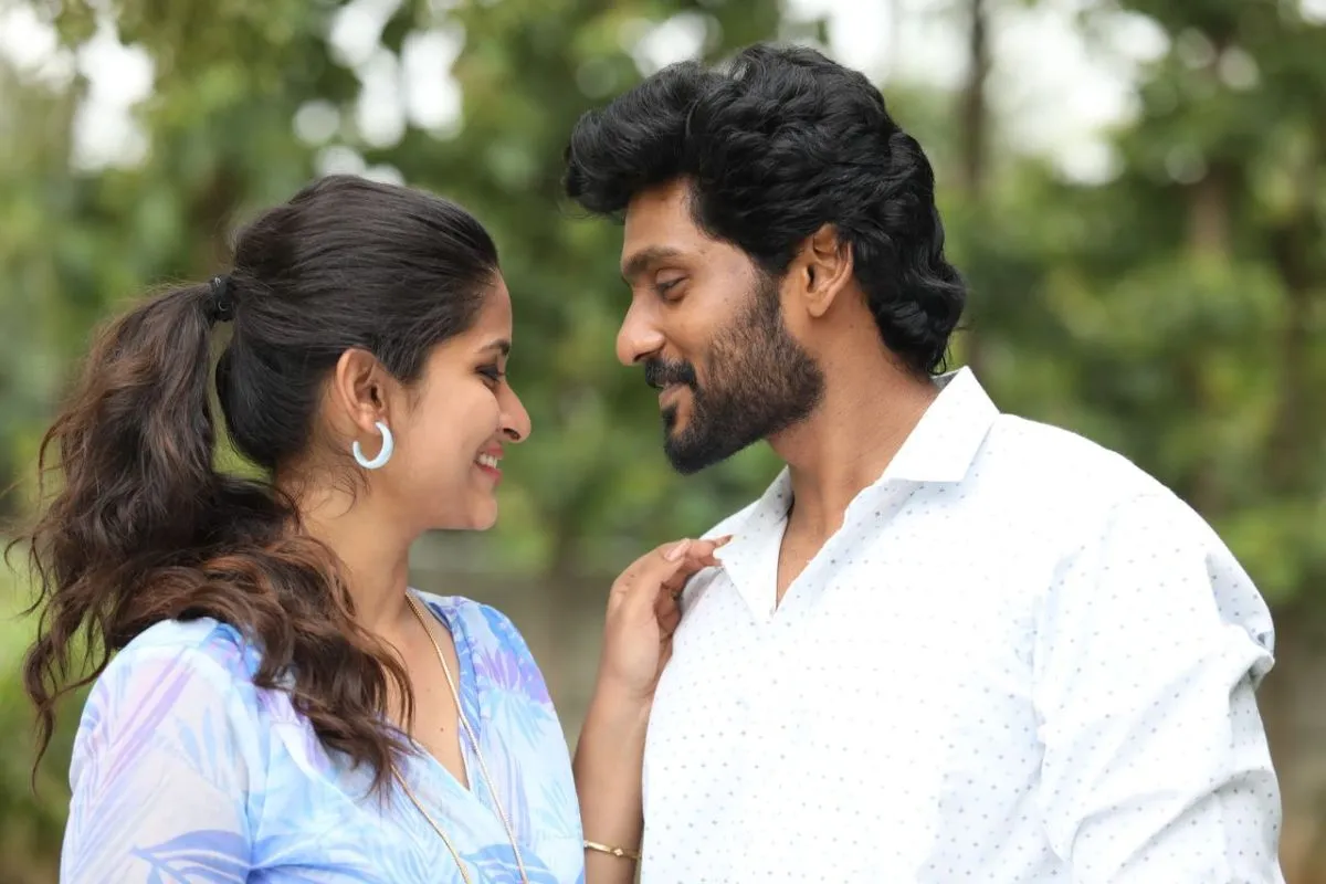 Lead pair from Breakfast Tamil movie in a park scene