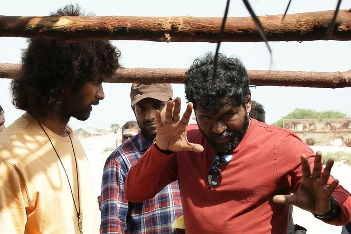 Director Jeeva Shankar explains a scene to Atharvaa Murali on the coastal set of Valai