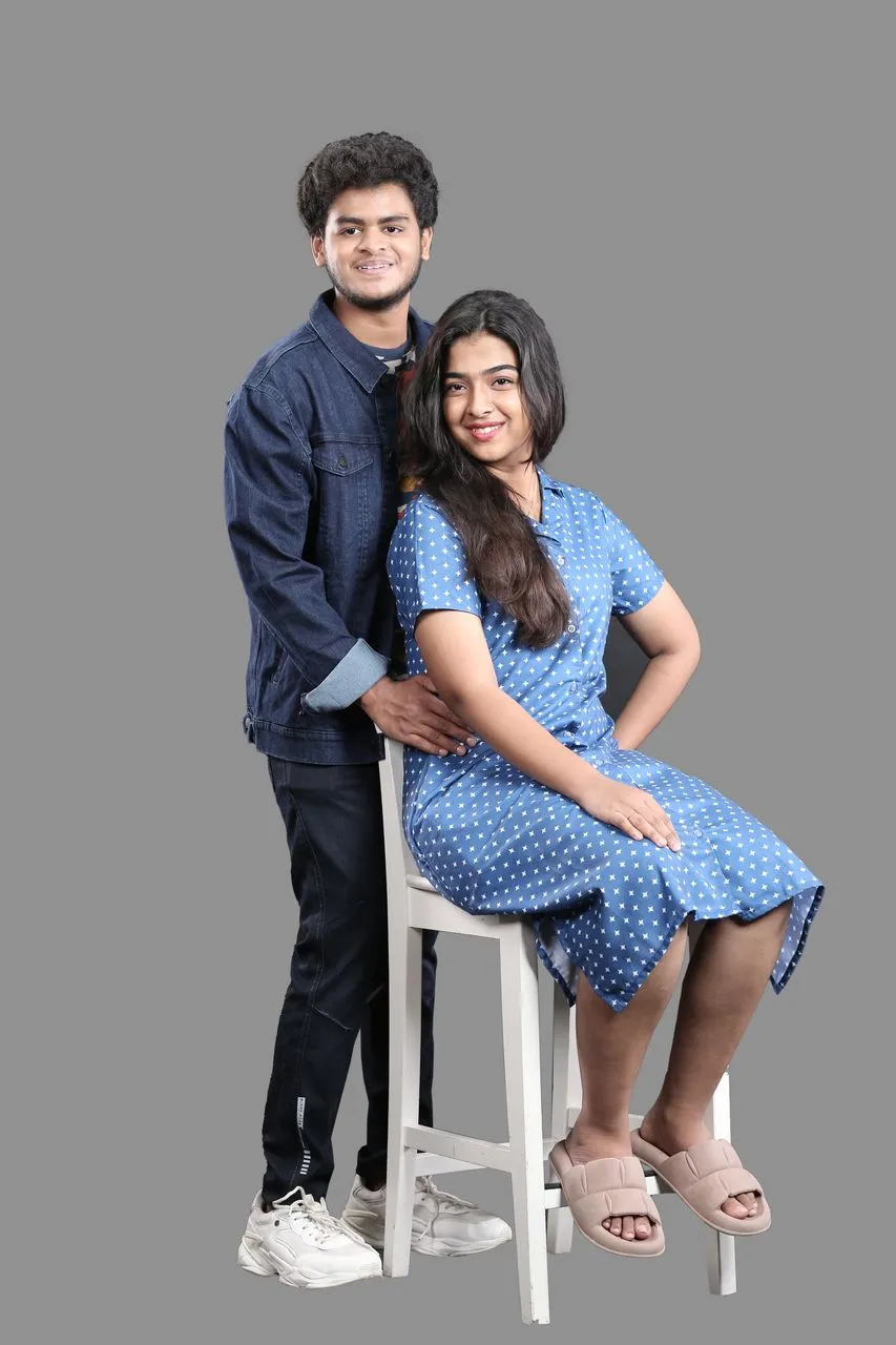 Sanjay and Nisha, played by C. Nikhil and Harsha, in a tender moment from Room Boy