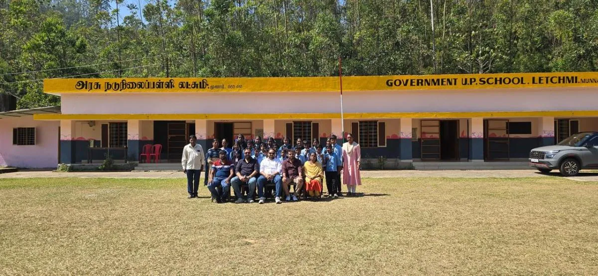 The renovated Government UP School Letchmi near Munnar with the Arivu film team and students