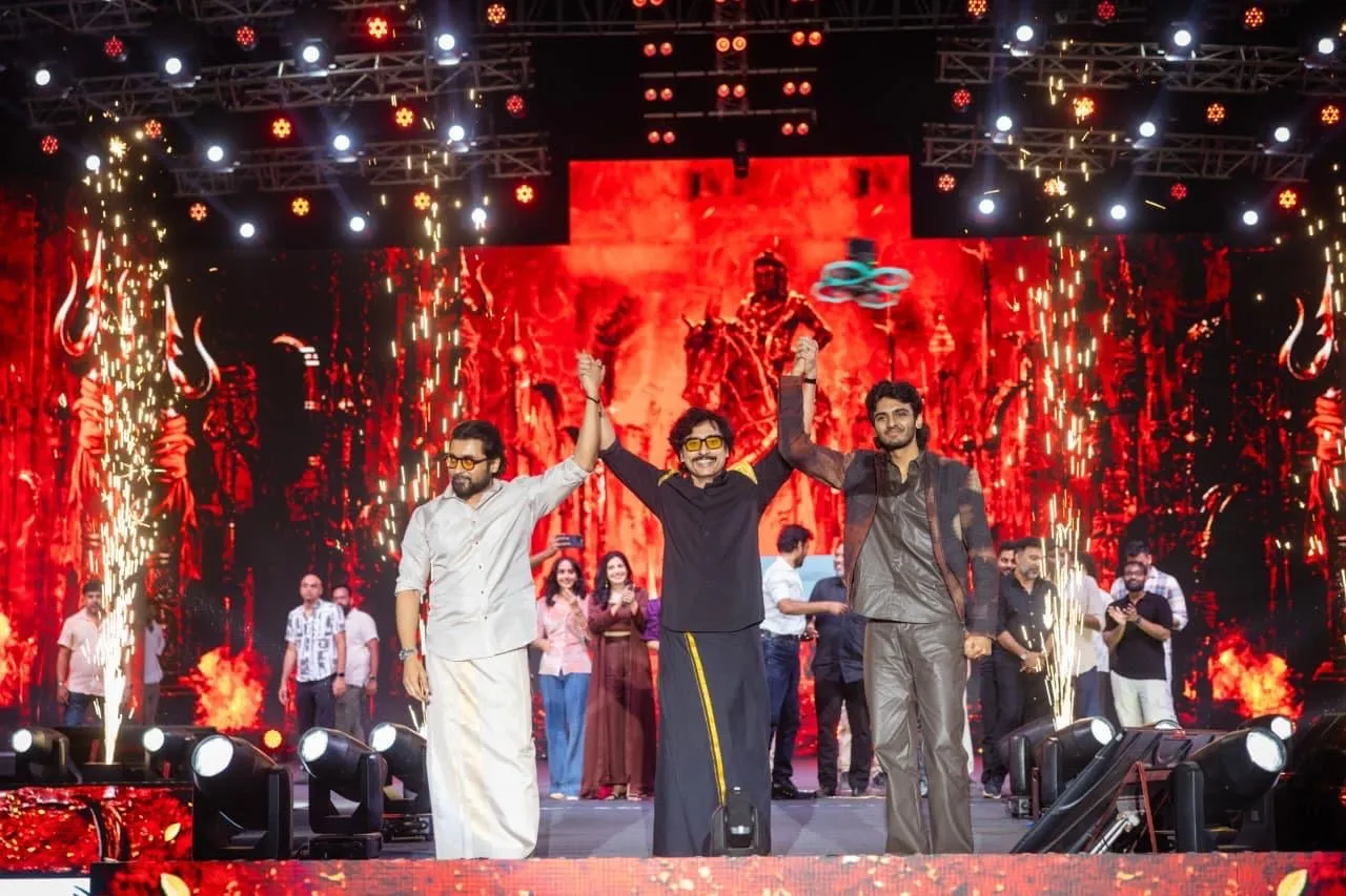 Suriya, RJ Balaji and Sai Abhyankkar on stage as the Karuppu reveal closes out in Madurai.