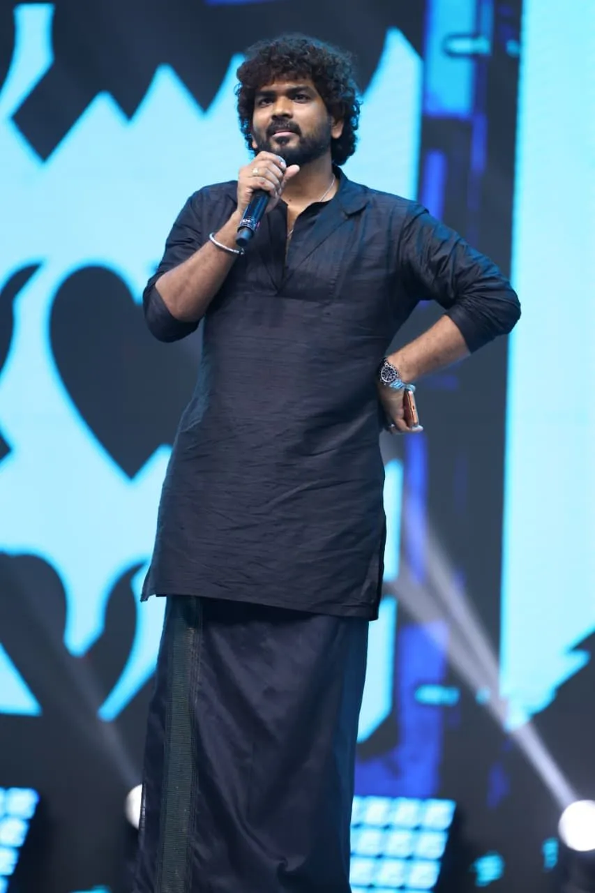 Director Vignesh Shivan speaking at the Love Insurance Kompany pre-release event