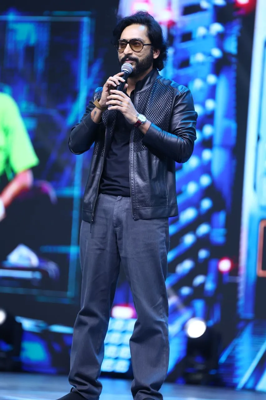 Pradeep Ranganathan on stage at the Love Insurance Kompany event