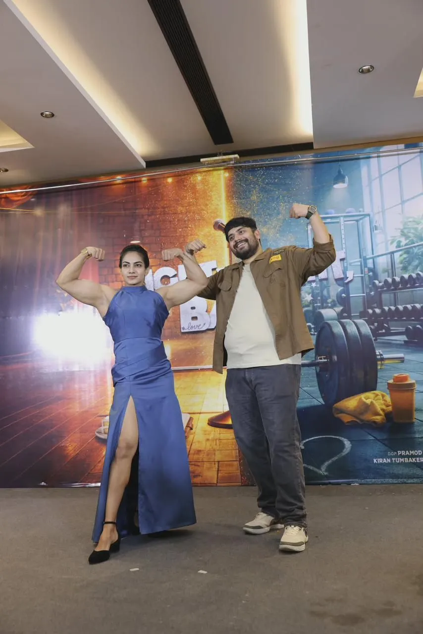 Aarthi Krishna and Vickels Vikram flex their biceps in front of the Lightweight Baby poster