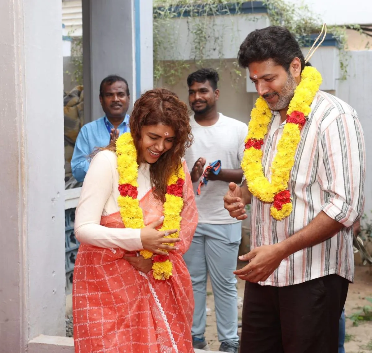 Ravi Mohan and producer Keneeshaa garlanded at the An Ordinary Man launch