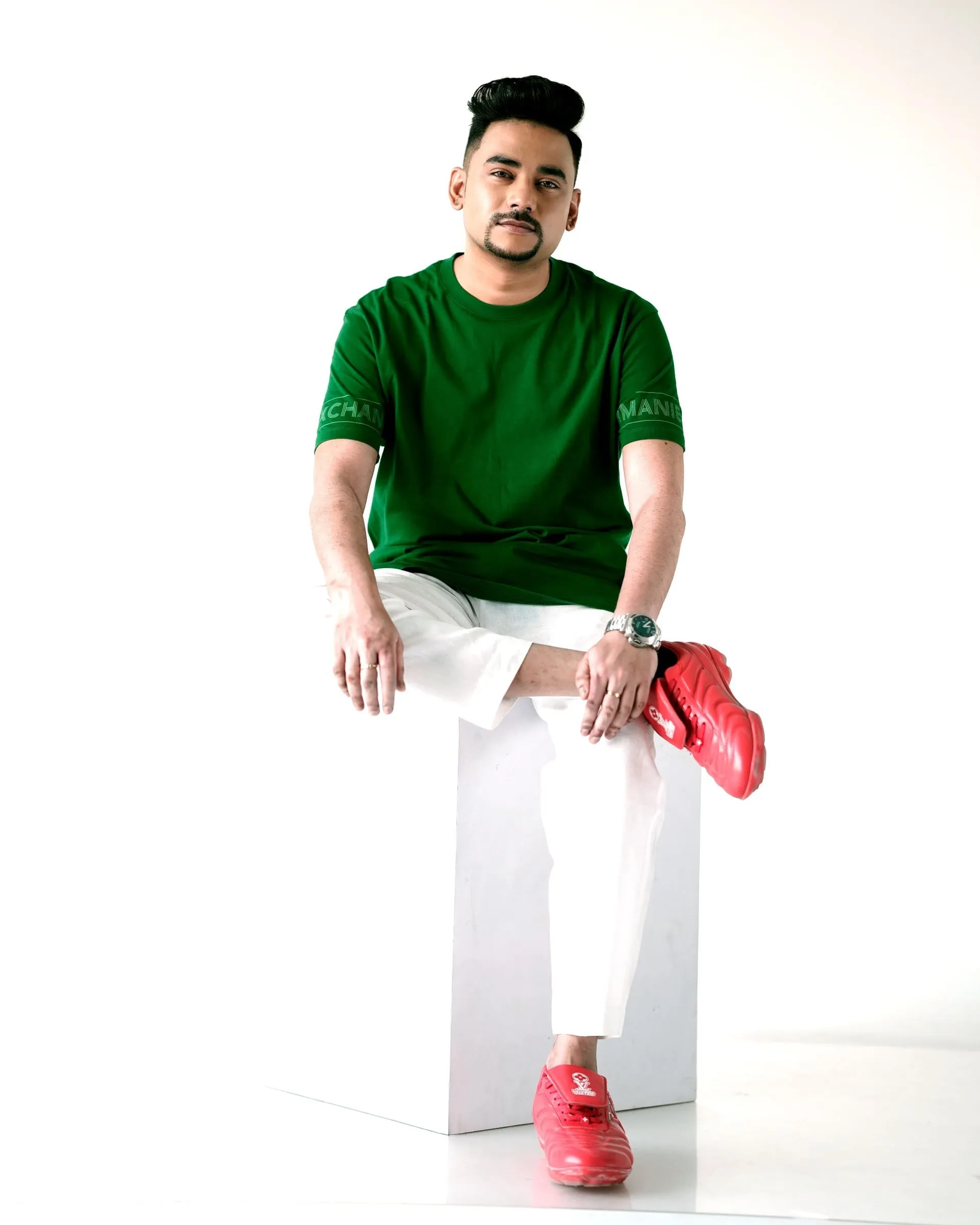 Sam C.S. in a green portrait