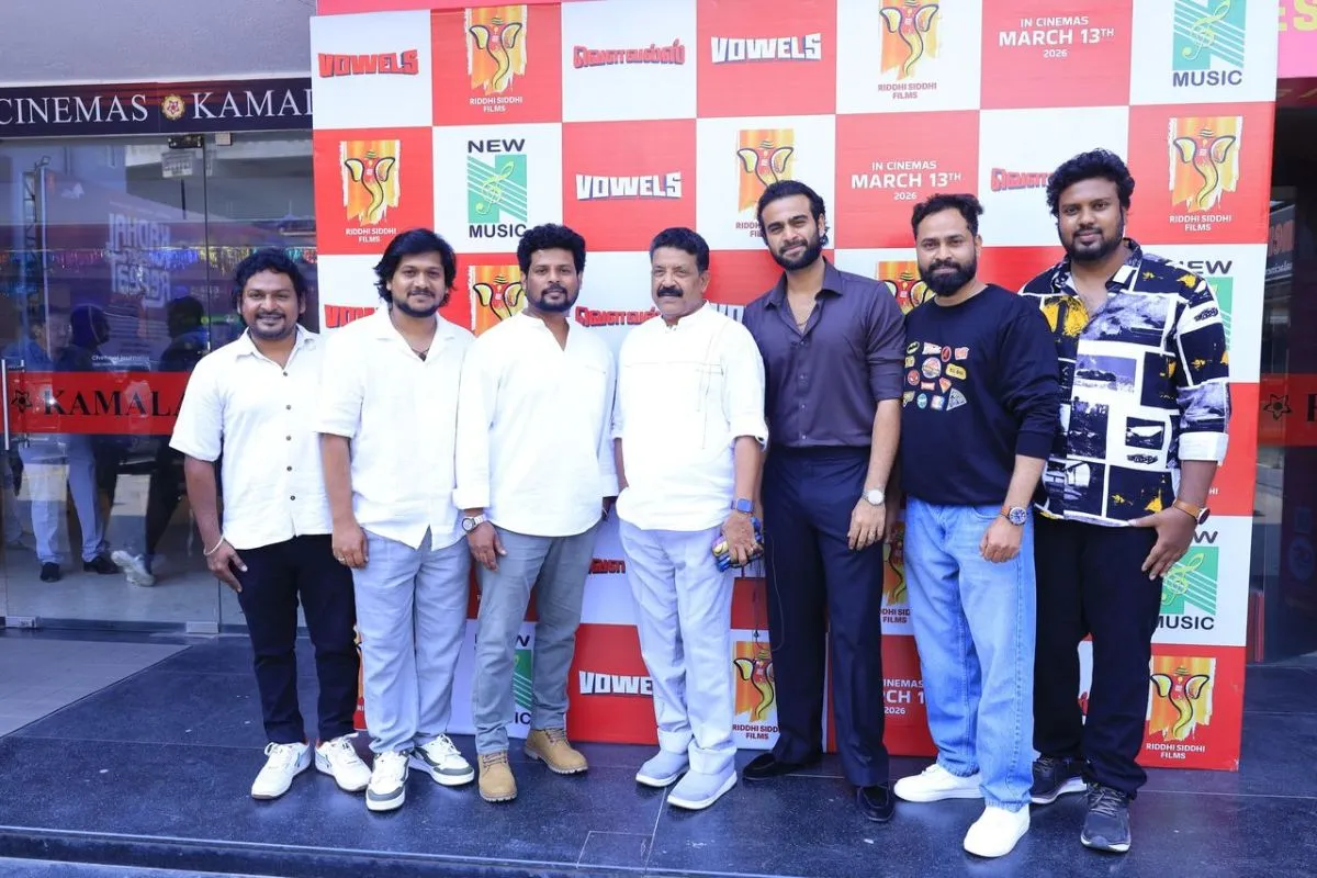 Vowels directors and actors outside Kamal Cinemas