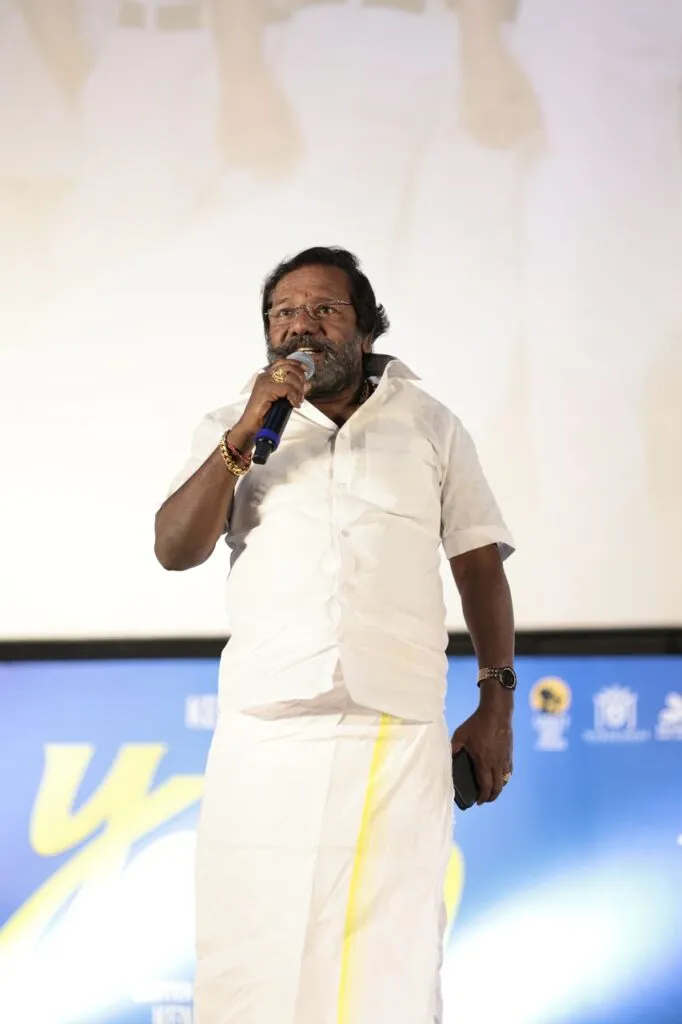 Actor Karunas speaking at the Youth pre-release event