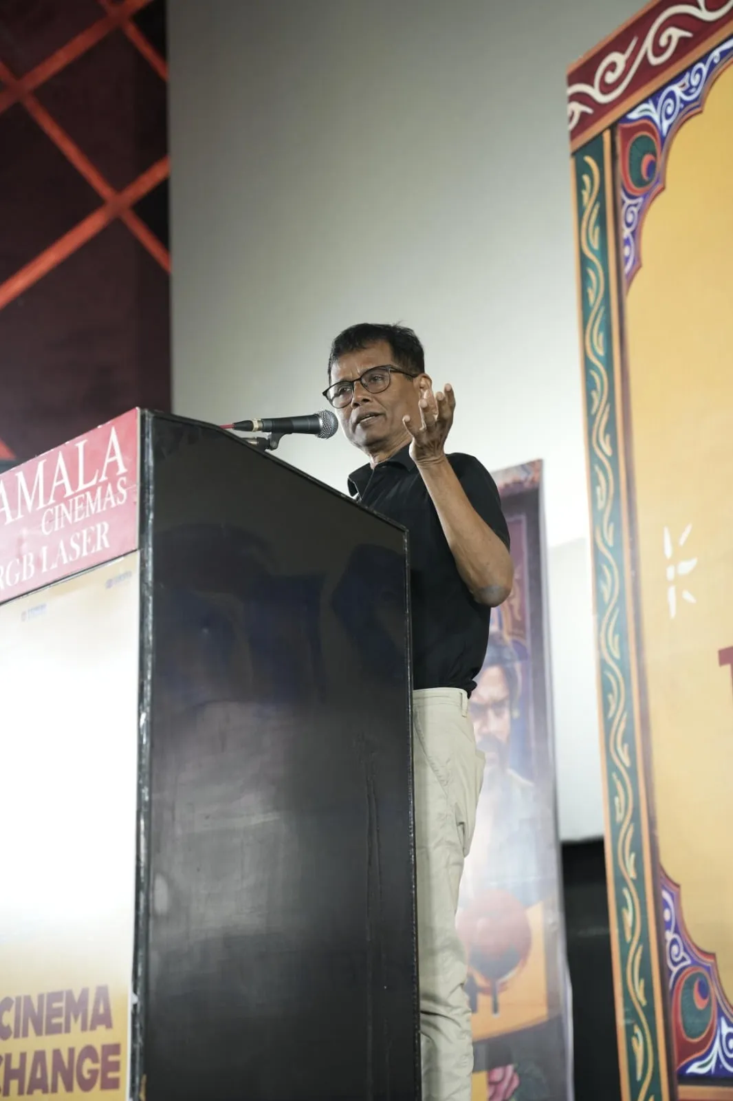 A speaker addresses the audience at the Dorothy thanksgiving event