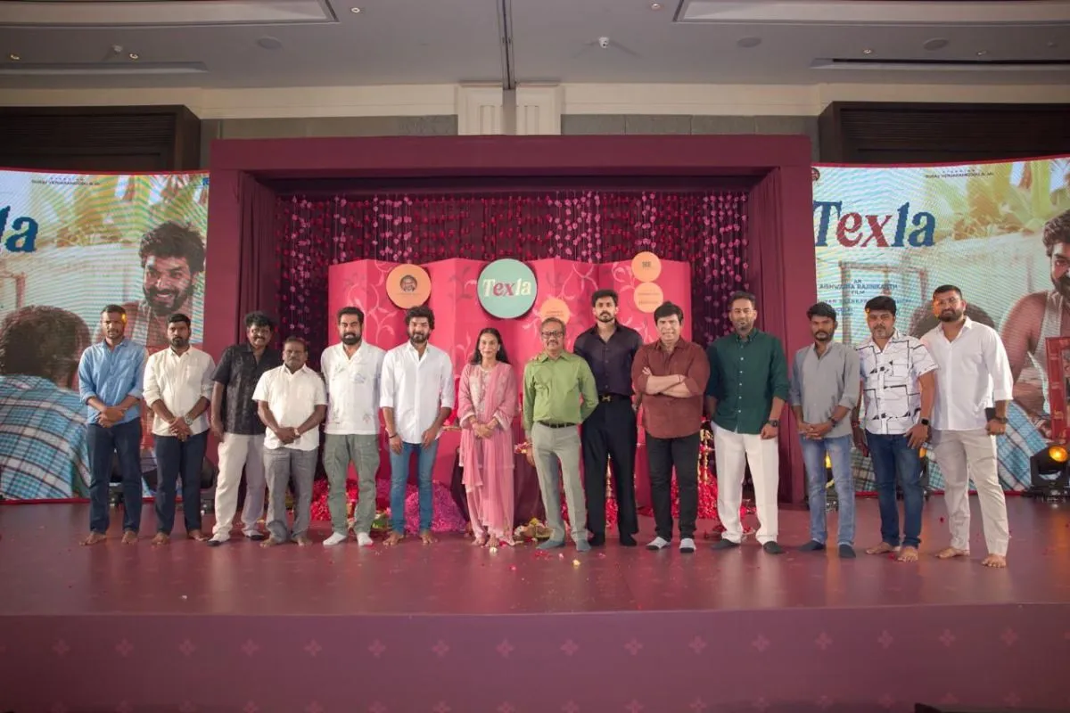 Texla team group photo on stage including Aishwarya Rajinikanth and Kannan Ravi