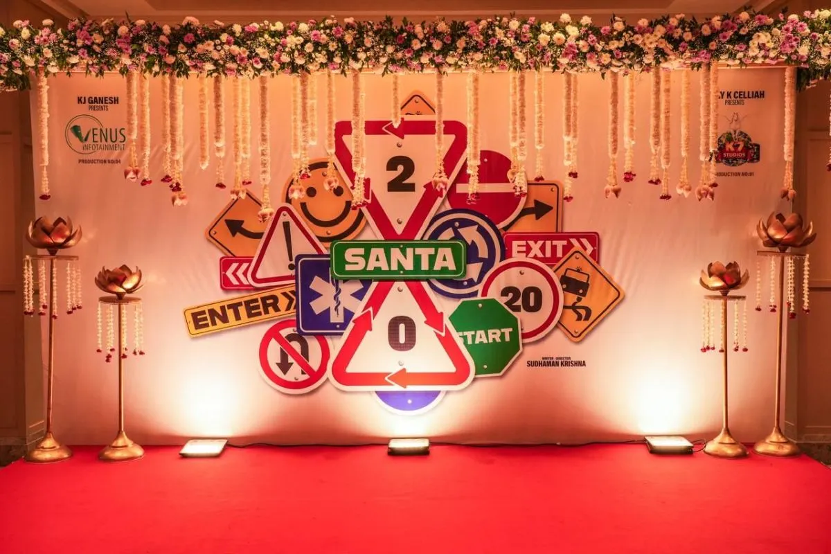 Santa 20 decorated title backdrop at the launch event