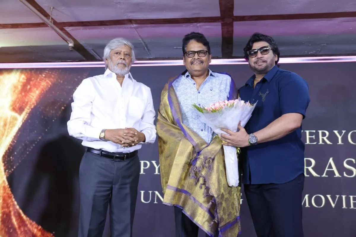 Director KS Ravikumar is honoured on stage at the Ranjan The Advocate title launch