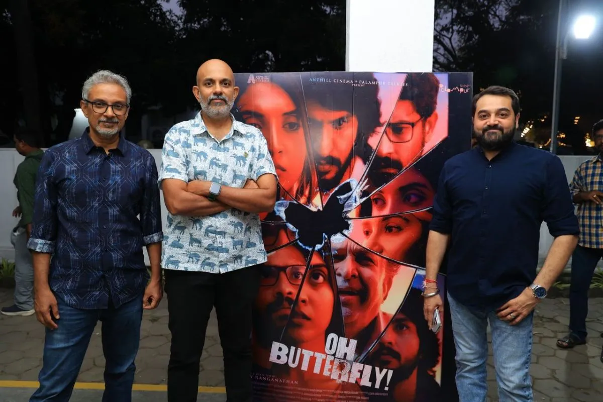 Oh Butterfly producers with the film poster